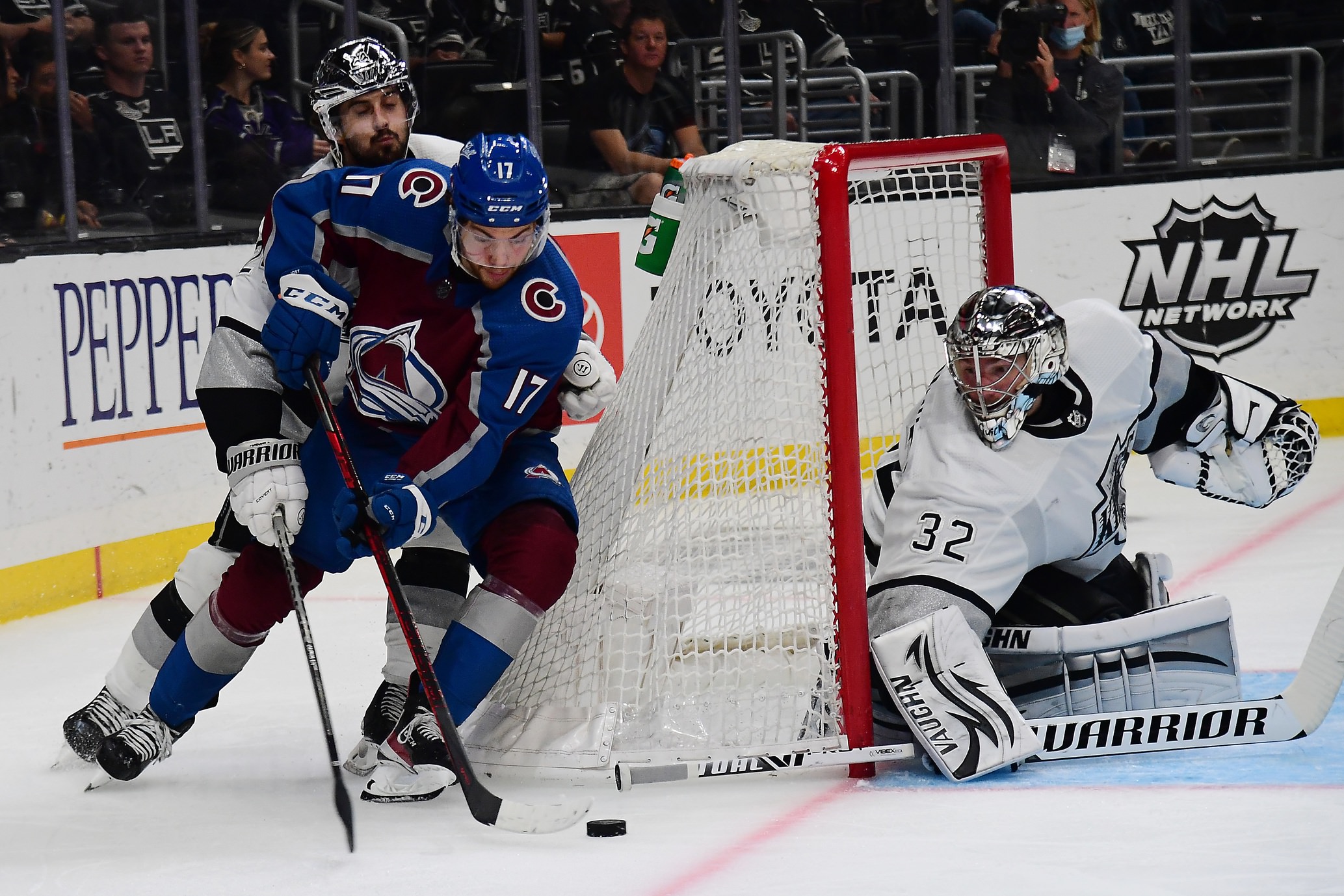 Colorado Avalanche center Tyson Jost (17) moves in for a shot on goal against Los Angeles Kings goaltender Jonathan Quick (32) and center Phillip Danault (24)